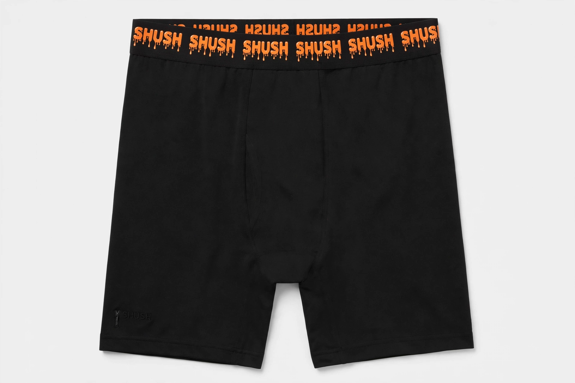 SHUSH fitted boxer brief in black — plain solid black, wide waistband repeating SHUSH in orange dripping letters