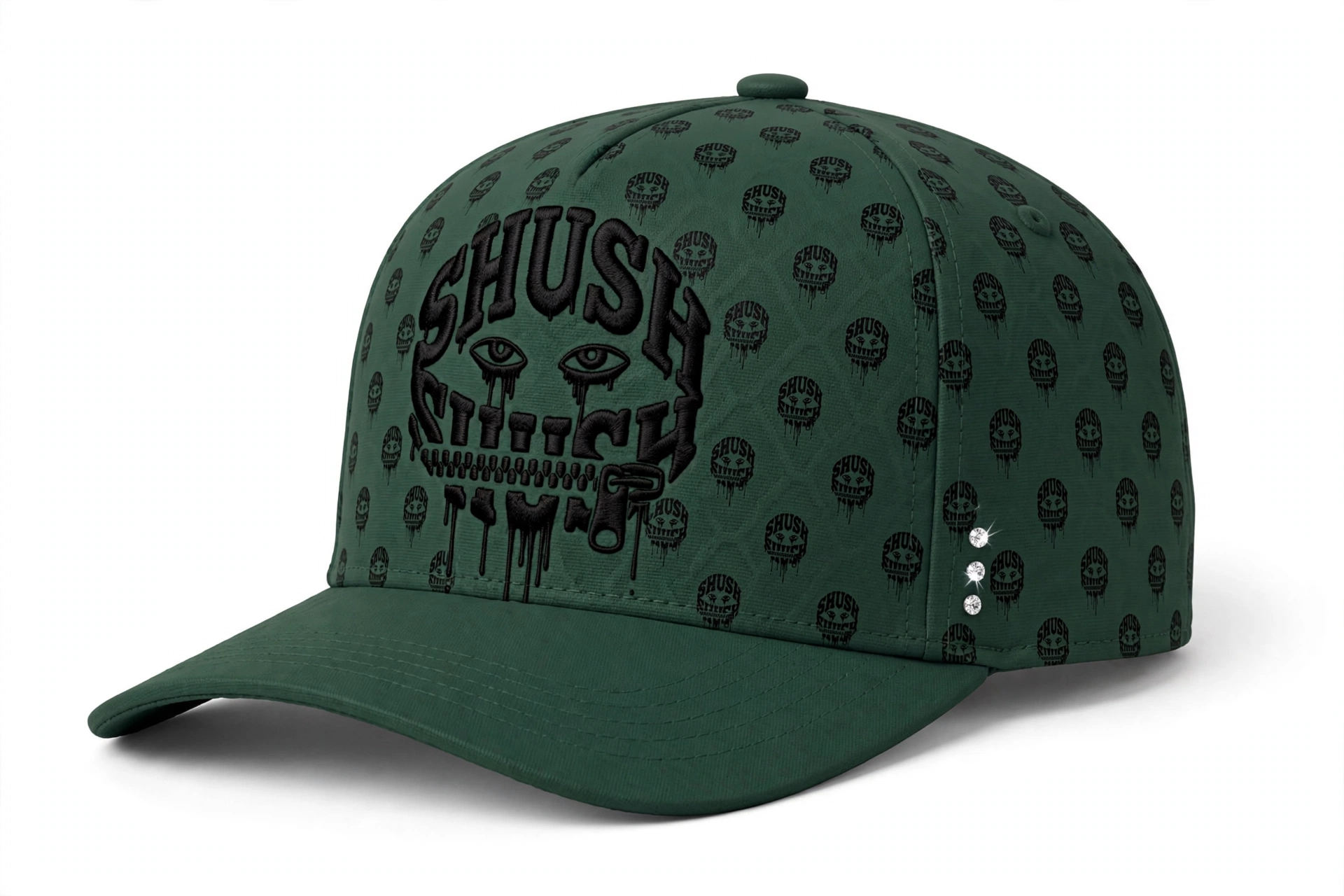 Forest green SHUSH fitted hat with an all-over engraved skull pattern, black SHUSH centerpiece and three subtle gems on the side