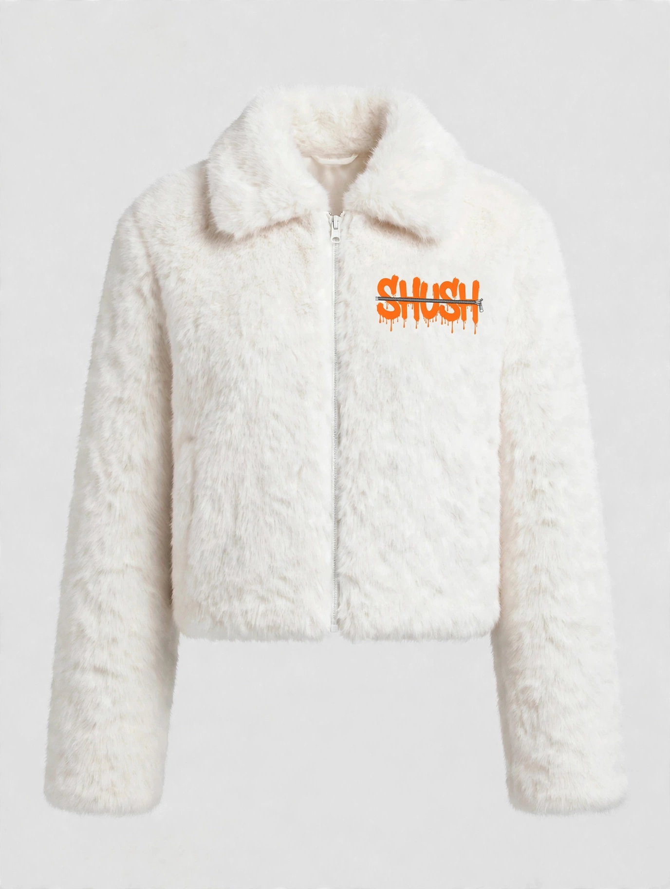Women\u2019s cropped white faux-fur jacket, front view — plush fur, zip front, and a small embroidered SHUSH mark at the left shoulder: the word SHUSH in orange dripping letters zipped shut by a silver zipper