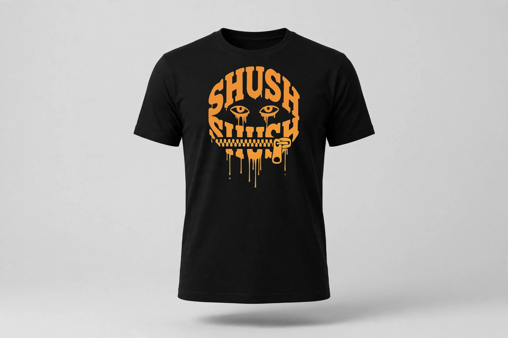 Black T-shirt with the large orange SHUSH face print across the chest — dripping letters, crying eyes and a zipper mouth